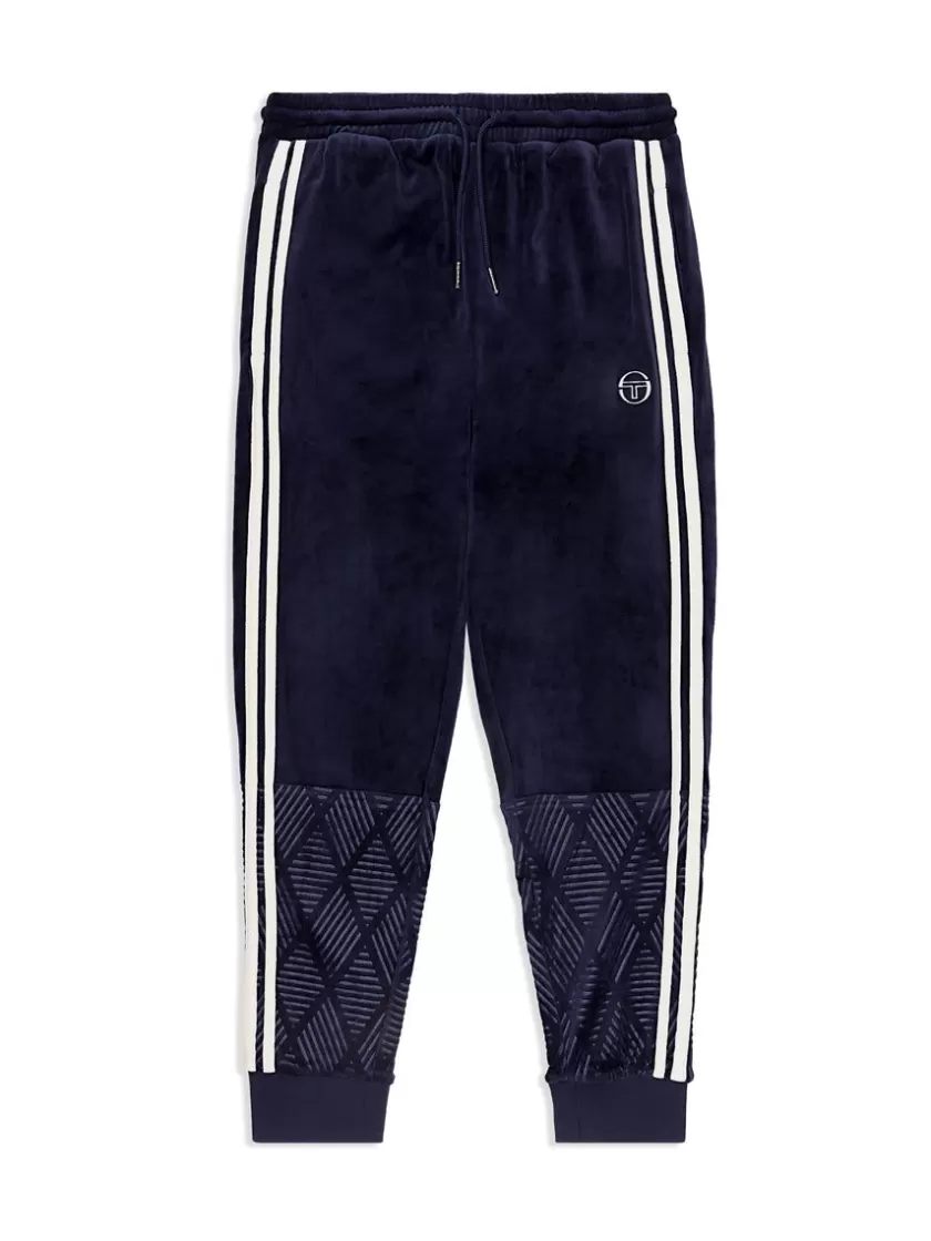 Shop Debossed Damarindo Velour Track Pant- Maritime Blue Pants And Sweatpants